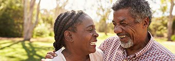 older couple looking at each other and smiling