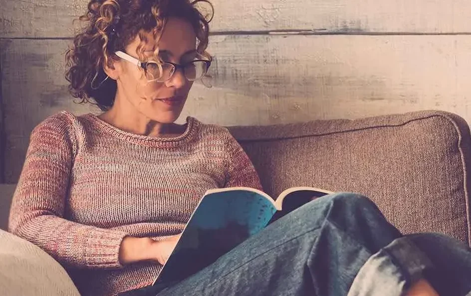 Woman reading on the couch